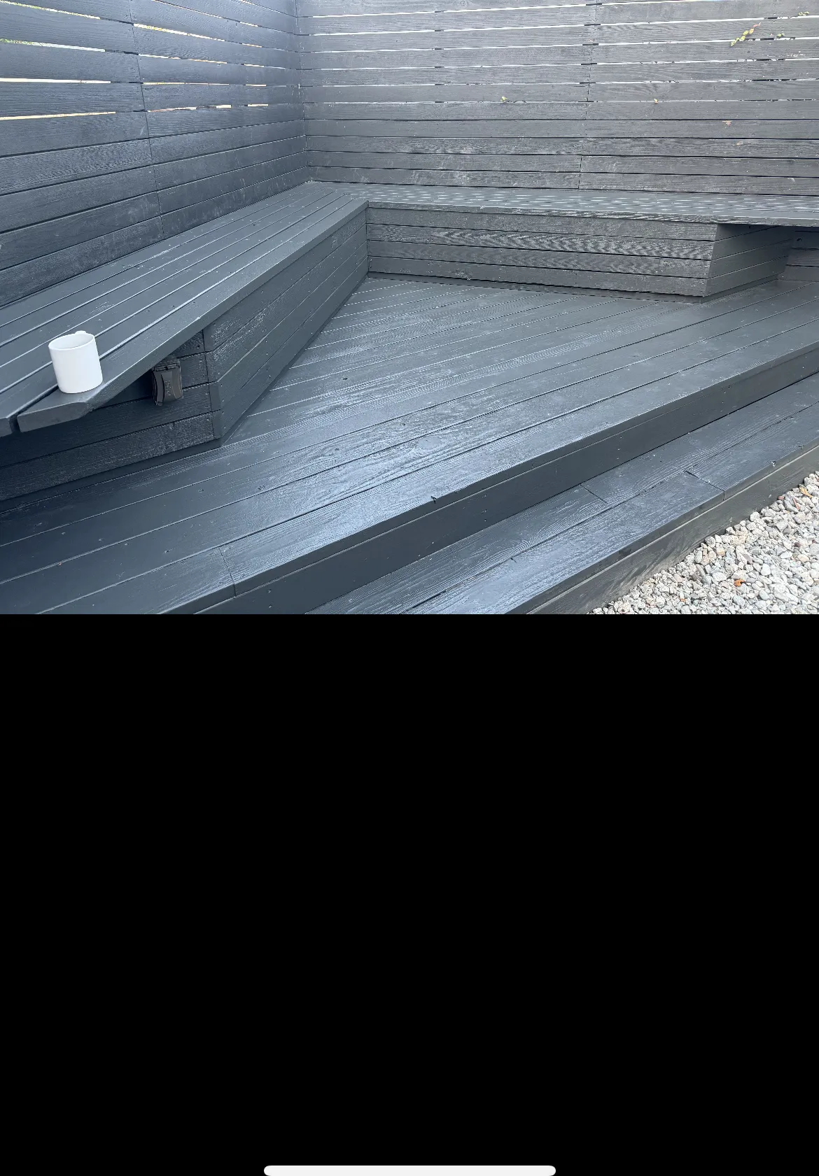 Overgrown backyard with shed before cleanup