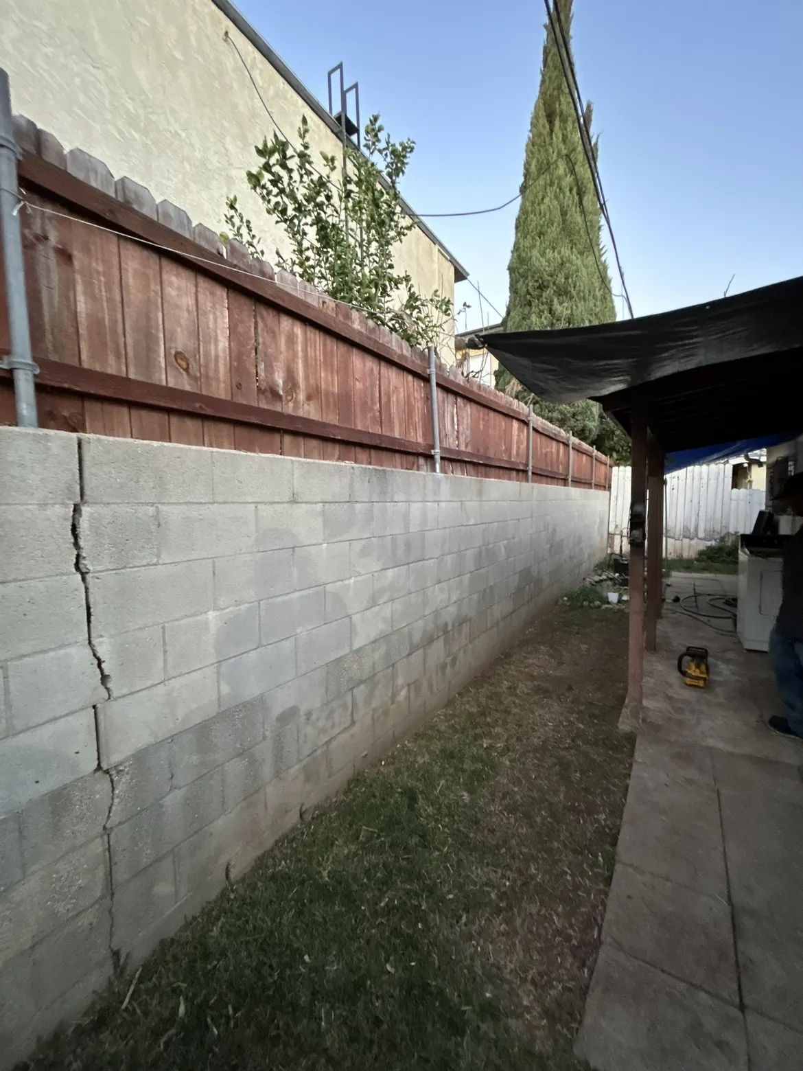 Block wall with fence extension for added privacy