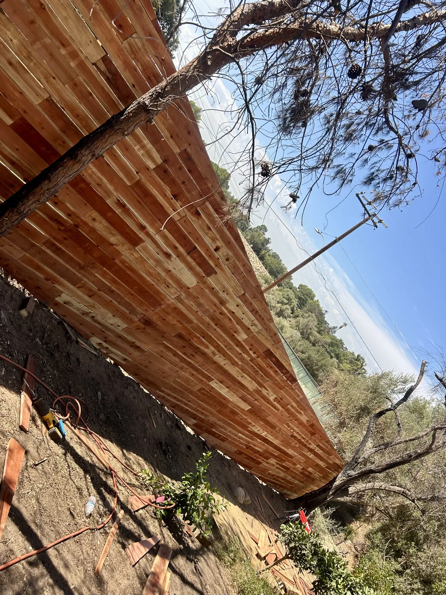Completed horizontal fence on hillside