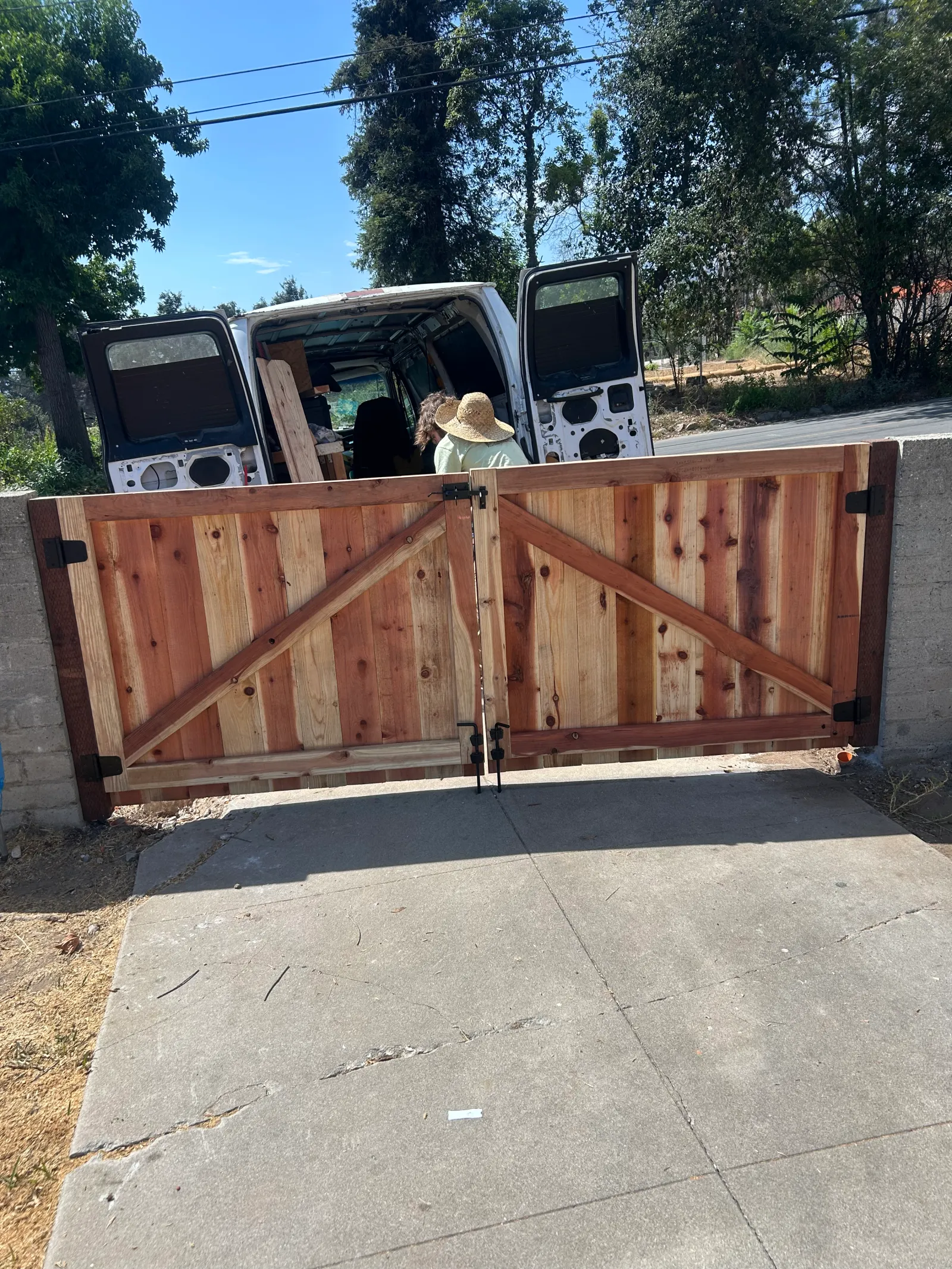Custom cedar gate with arched top installed in San Gabriel Valley