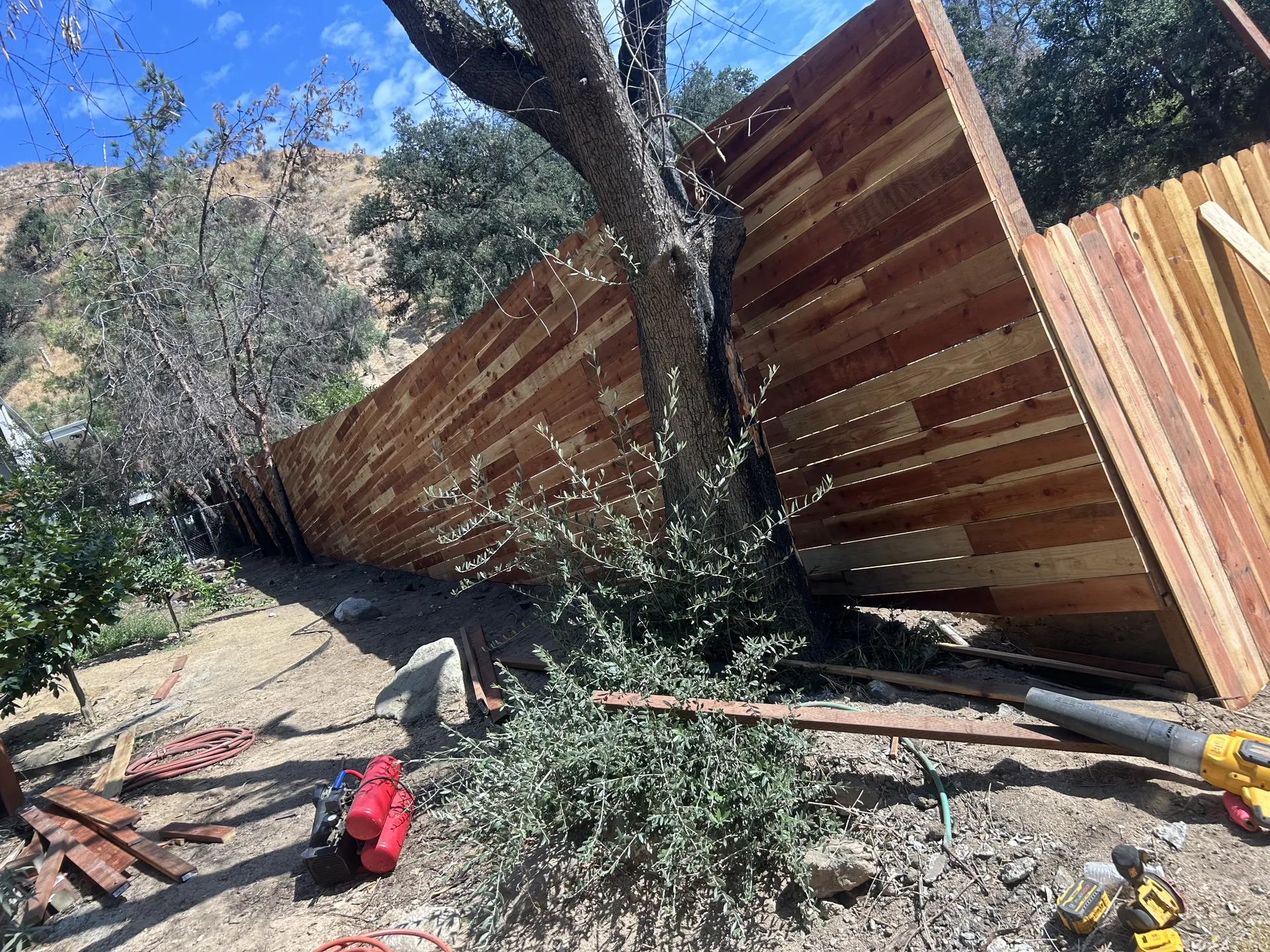 Horizontal fence meeting vertical fence section