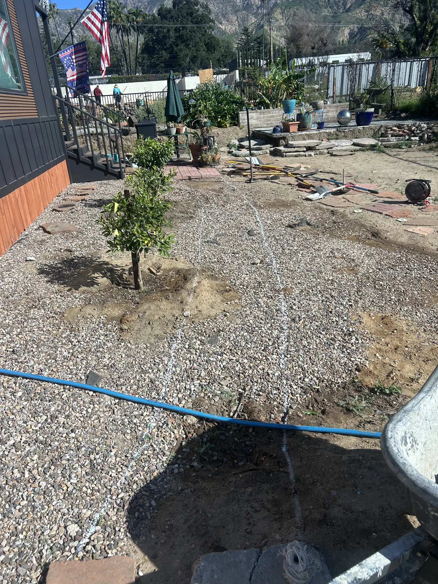 Hillside gravel work for pathway foundation