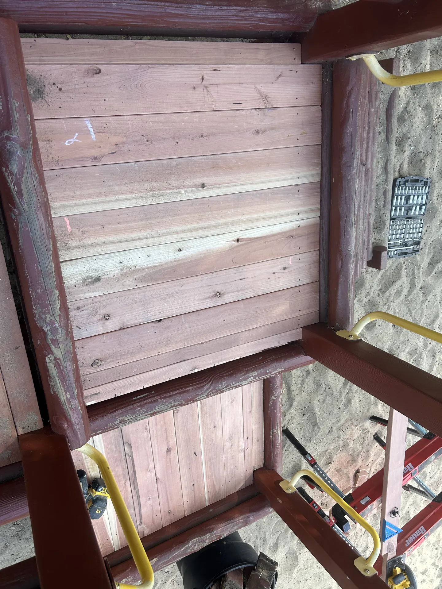 Fresh cedar deck planks after replacement