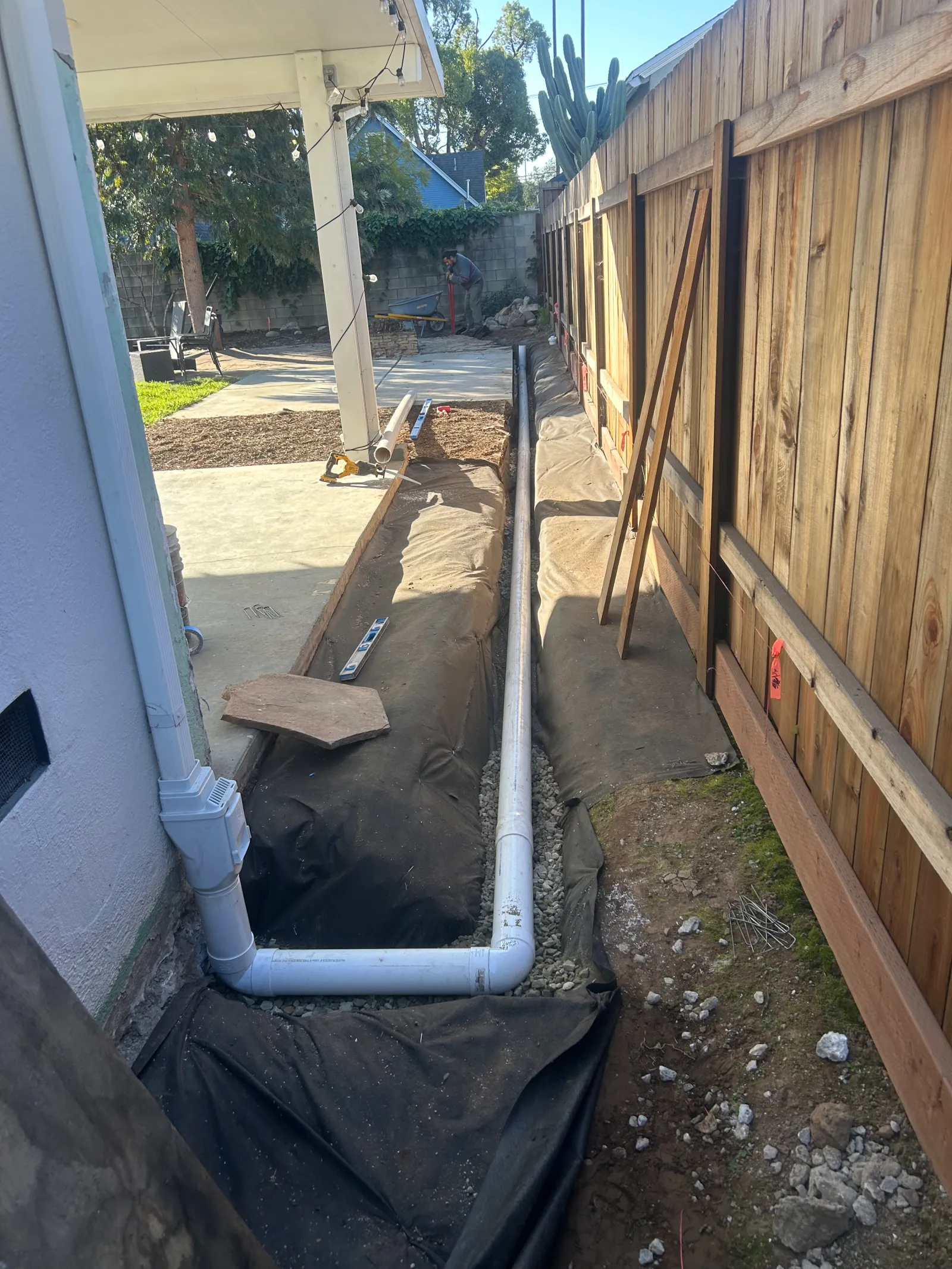 Patio framing with drainage system installation